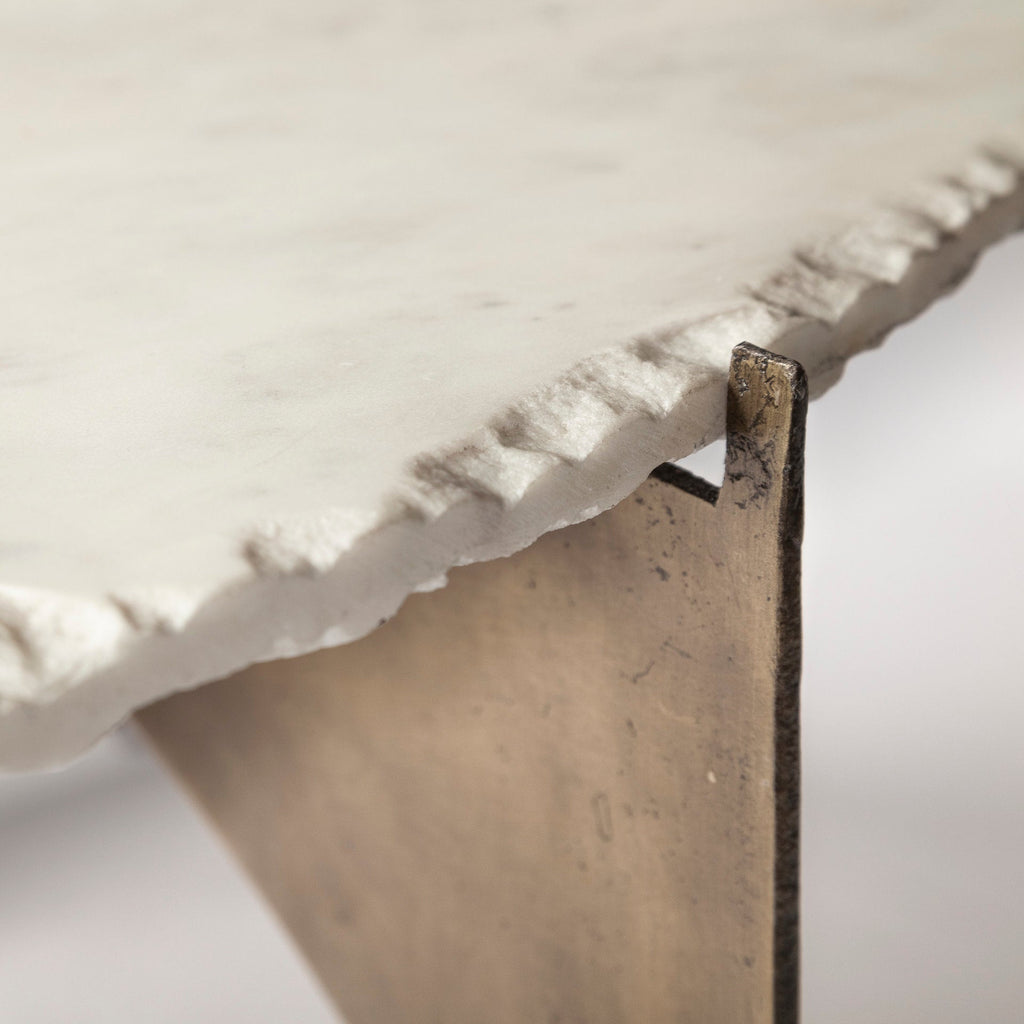 Mercana Reinhold 49" x 49" x 17" Stone Coffee Table