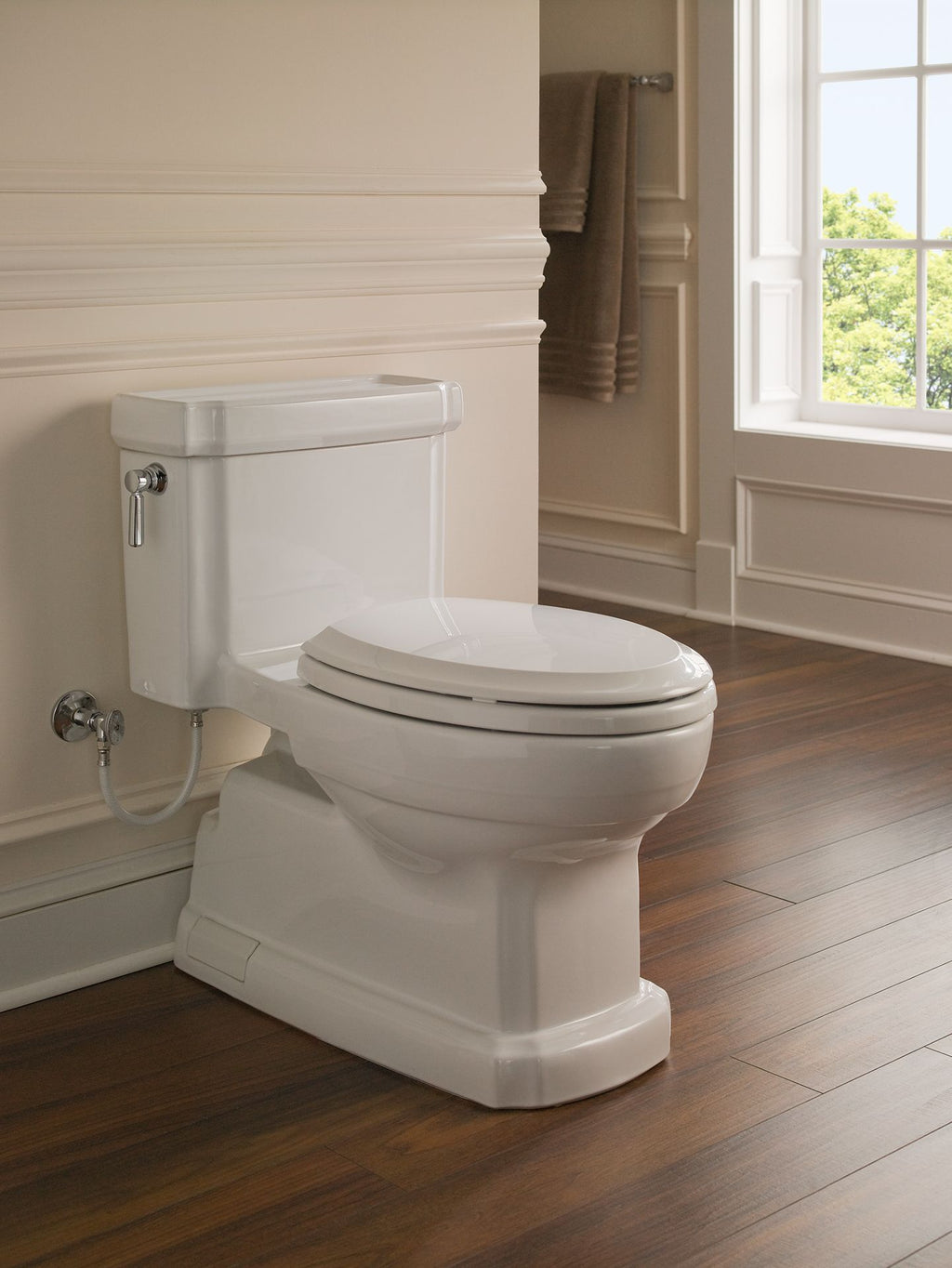 TOTO Eco Guinevere Elongated 1.28 GPF Universal Height Skirted Toilet with Softclose Seat